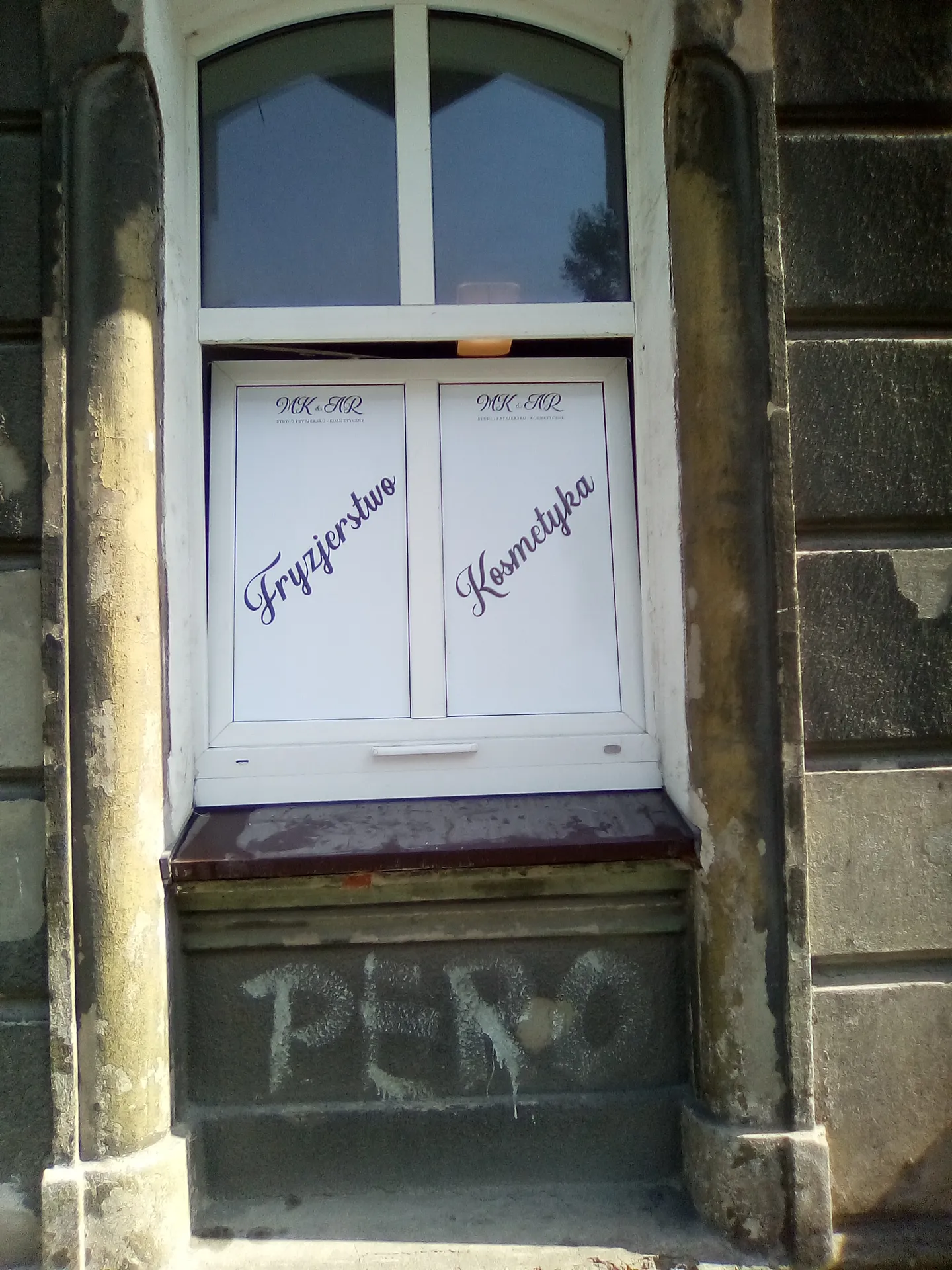 Oklejenie witryny dla studia MK &amp; AR