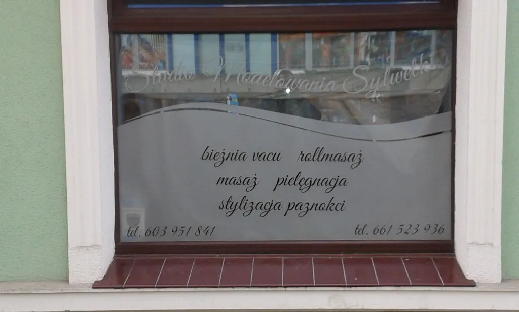 Realizacja oklejenia okna dla Studia Modelowania Sylwetki